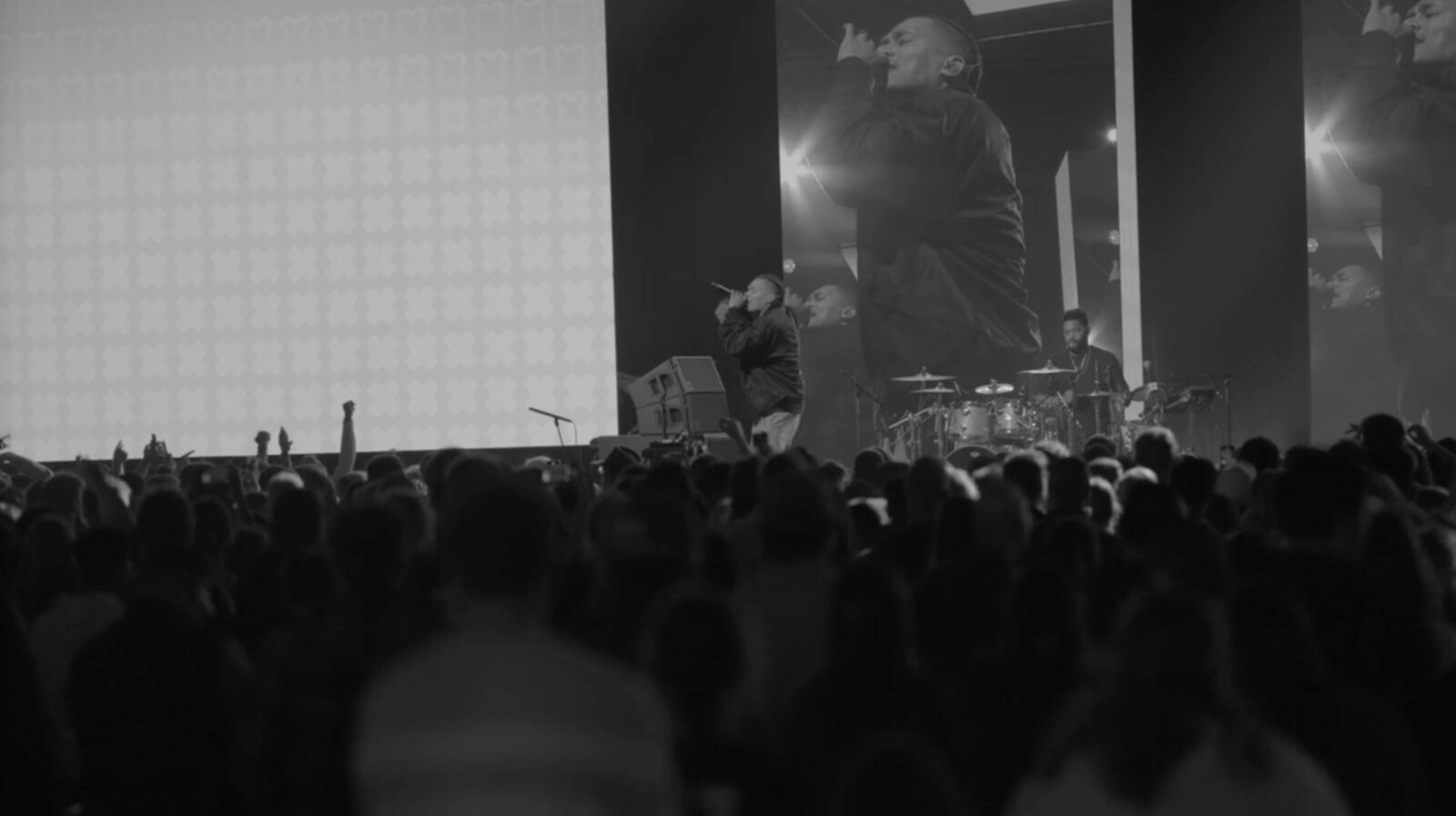 Live performance with LED screens and crowd